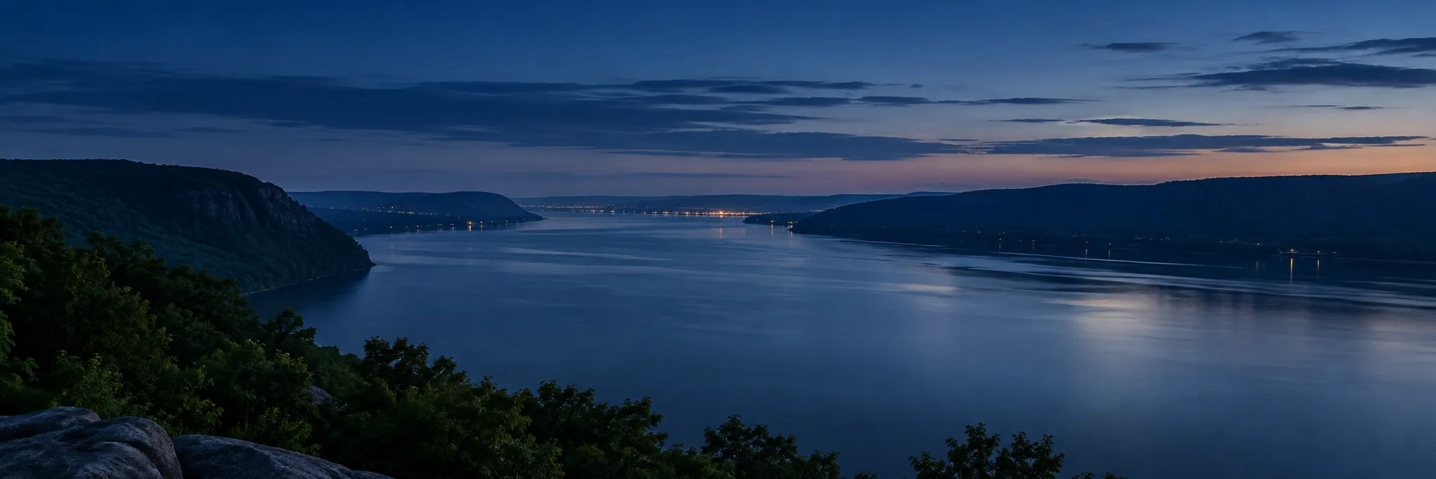 The Hudson River and wooded Palisades at blue hour