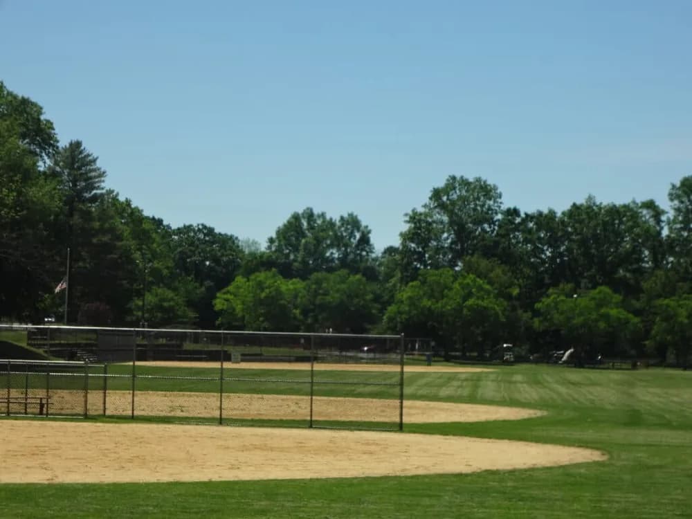 Ballfield and trees at Kings Park in Congers