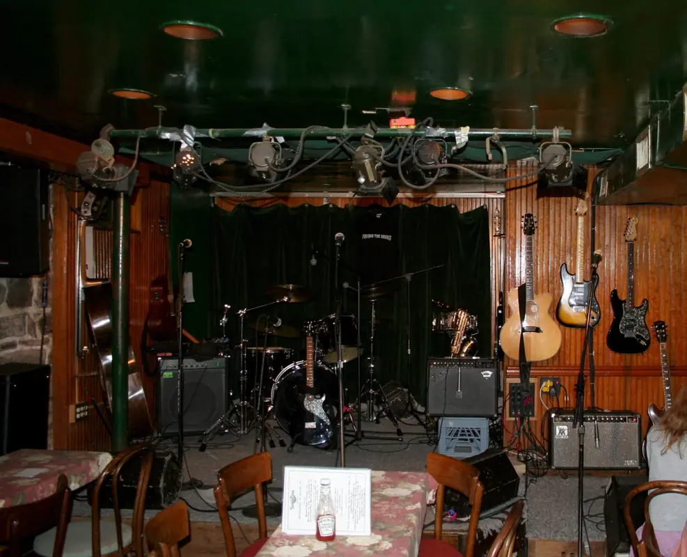 The Turning Point’s intimate stage with instruments and wood interior